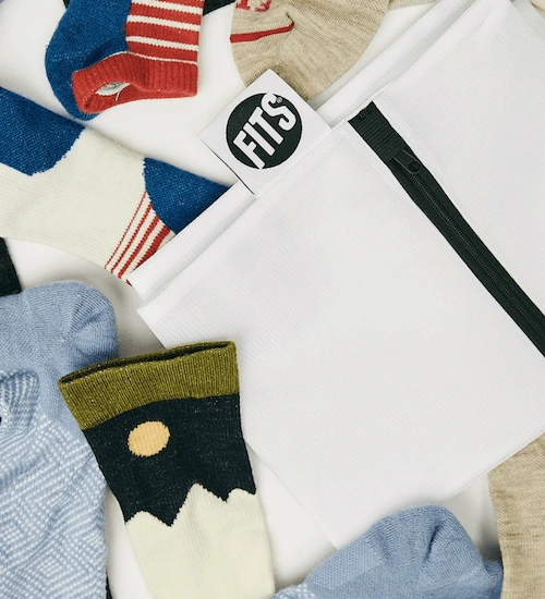 Carry Your Clean: The FITS Laundry Bag – Effortless Style & Space Saving!